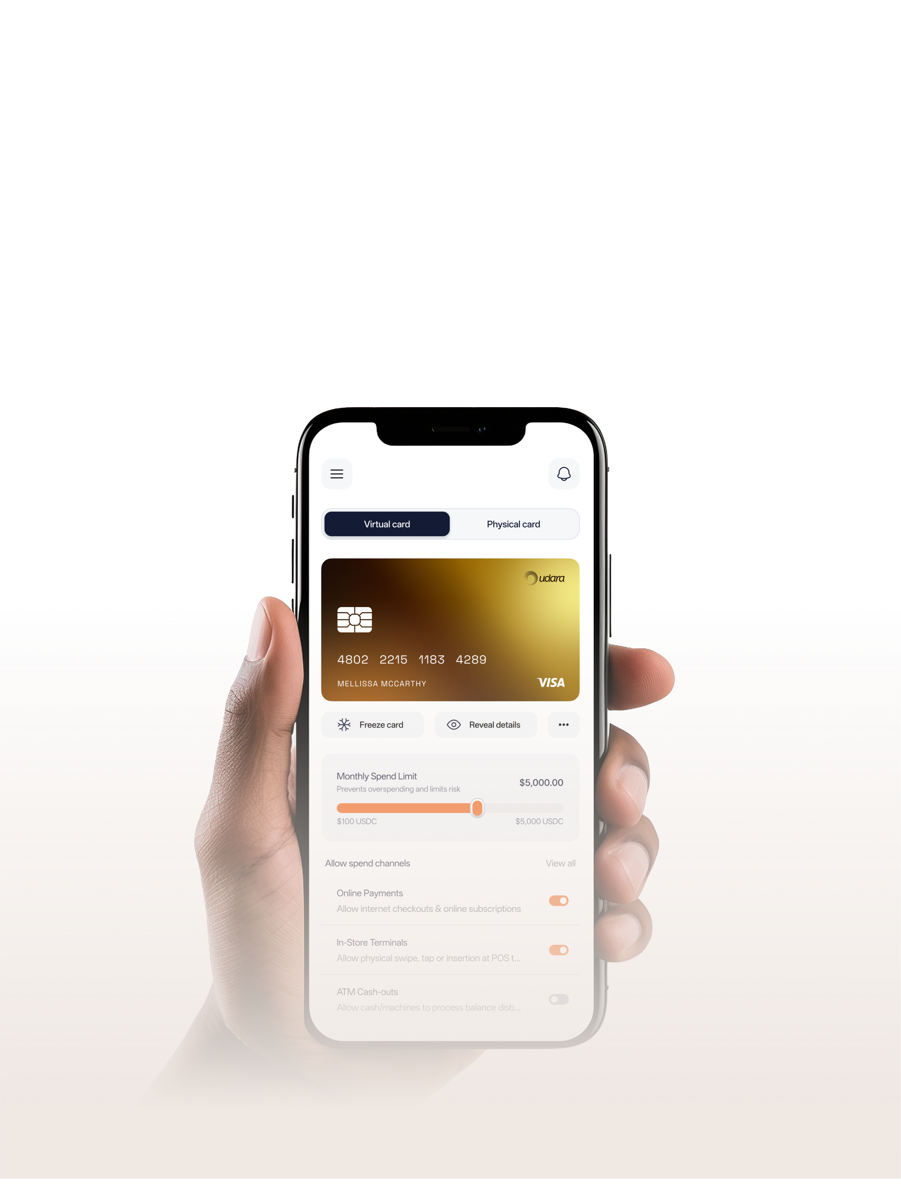 A hand holding a smartphone for the Udara app